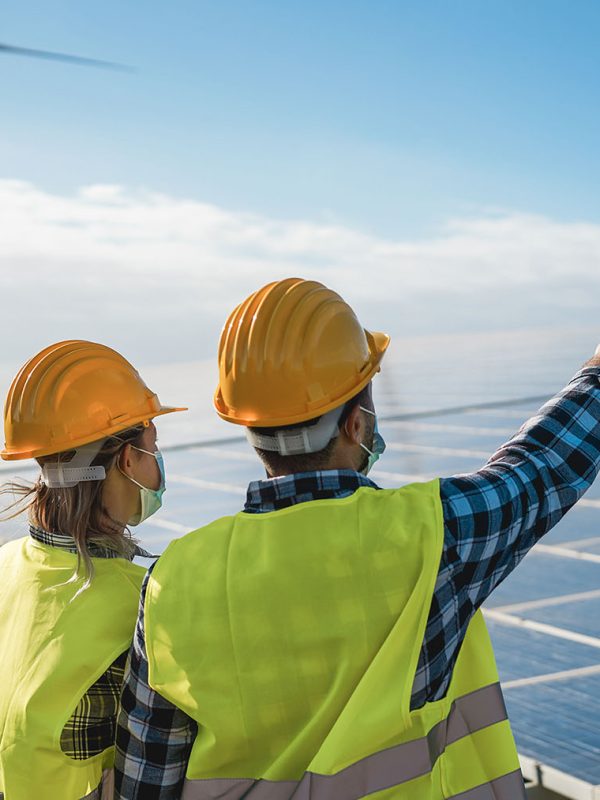 people-working-for-solar-panels-and-wind-turbines-2022-04-12-20-34-32-utc.jpg